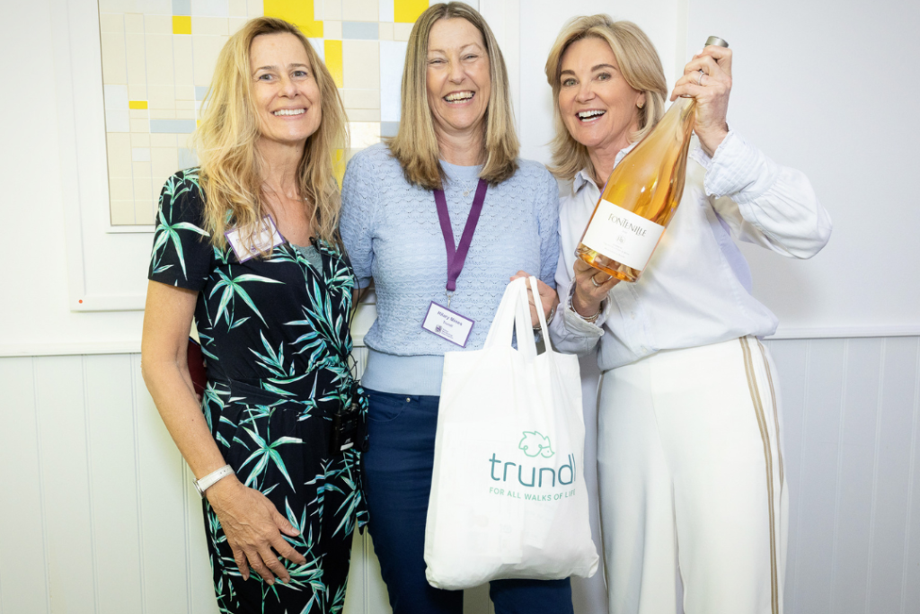 Hil Mines founder of walking for charity app trundl receives an award from Anthea Turner and Debbie Marshall from Silver Marketing Association