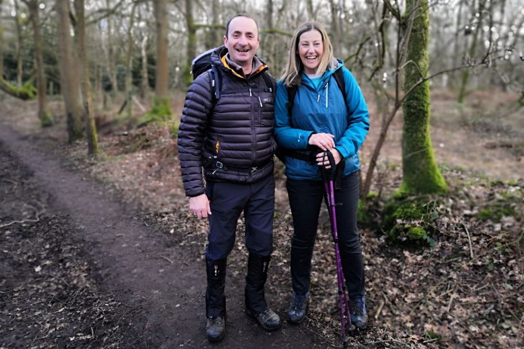 Walking for charity app founder Hil Mines is walking with a friend in an autumn landscape